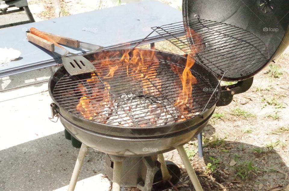 getting the grill ready for steaks