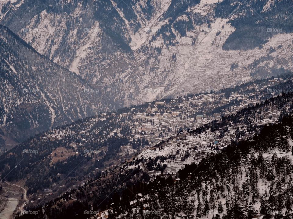 Small town in Himalayas in Snow