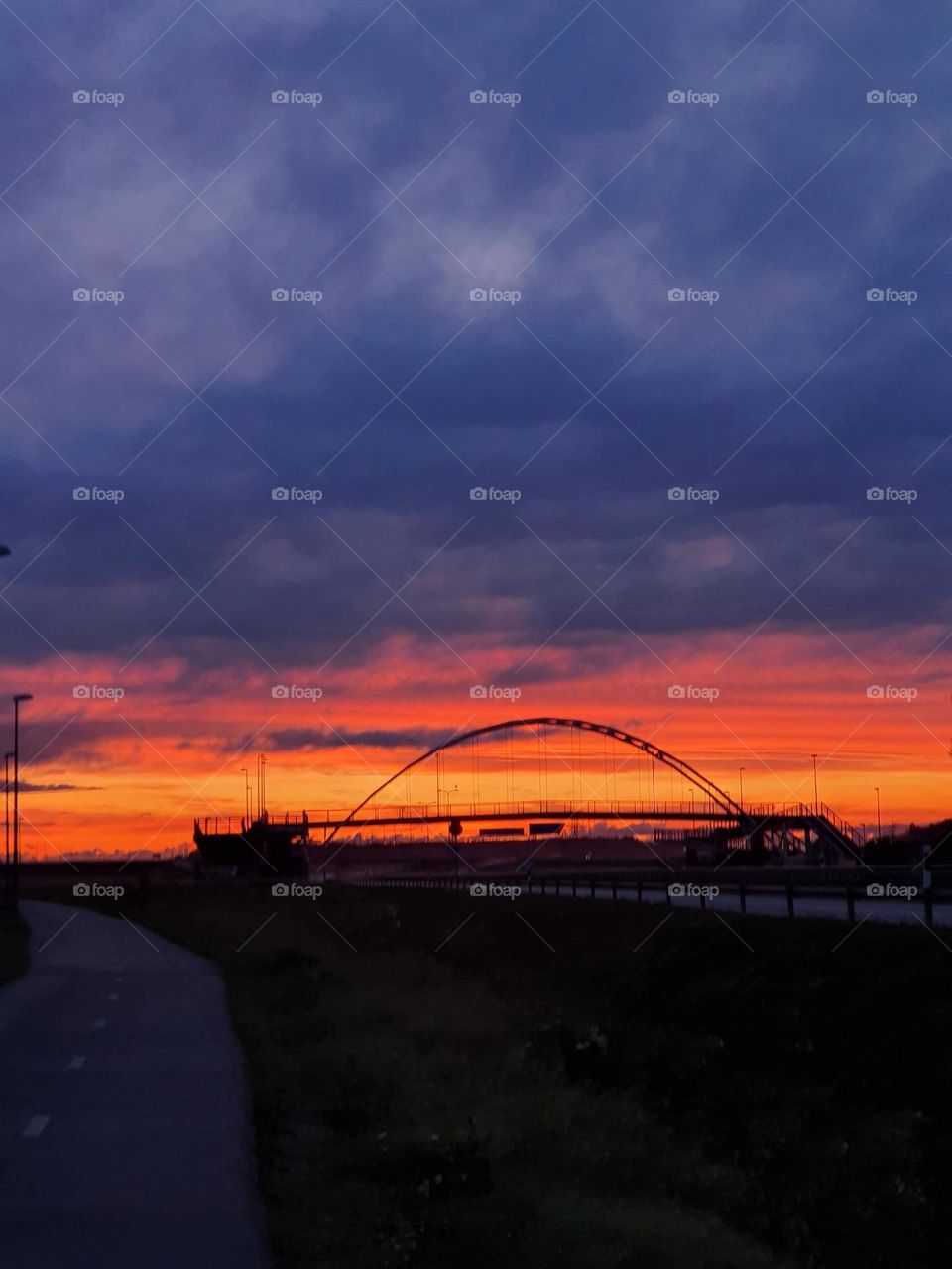 Fiery sunset above the bridge.