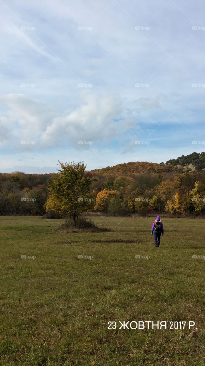 Hiking, man at the field 