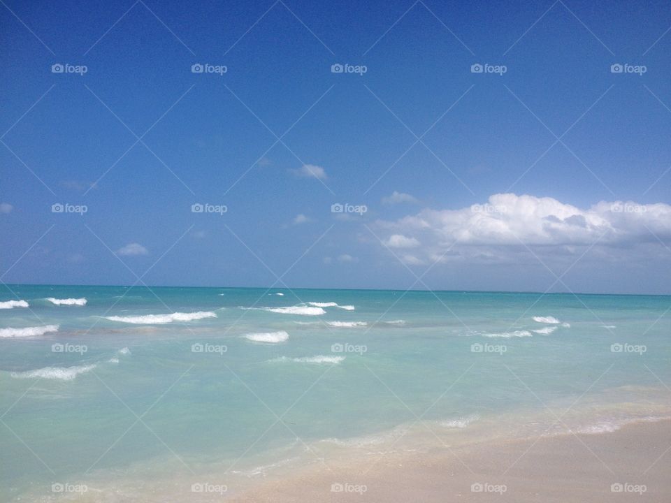 Clouds hovering over the ocean