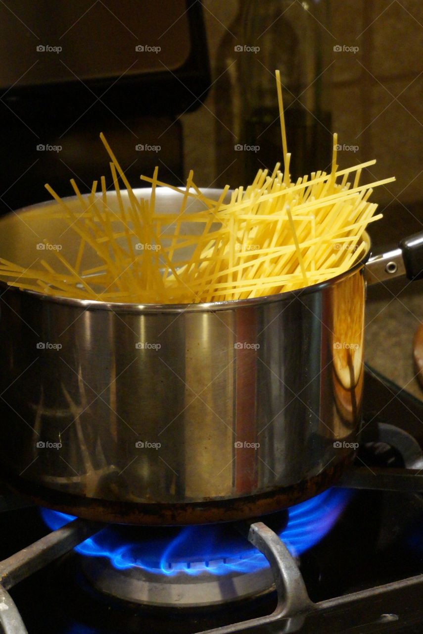 Pasta in the pot of boiling water