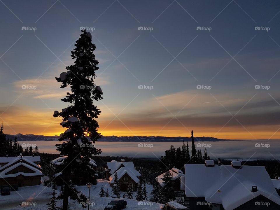Sunrise from the chalet looking over the valley with inverted cloud layer.
