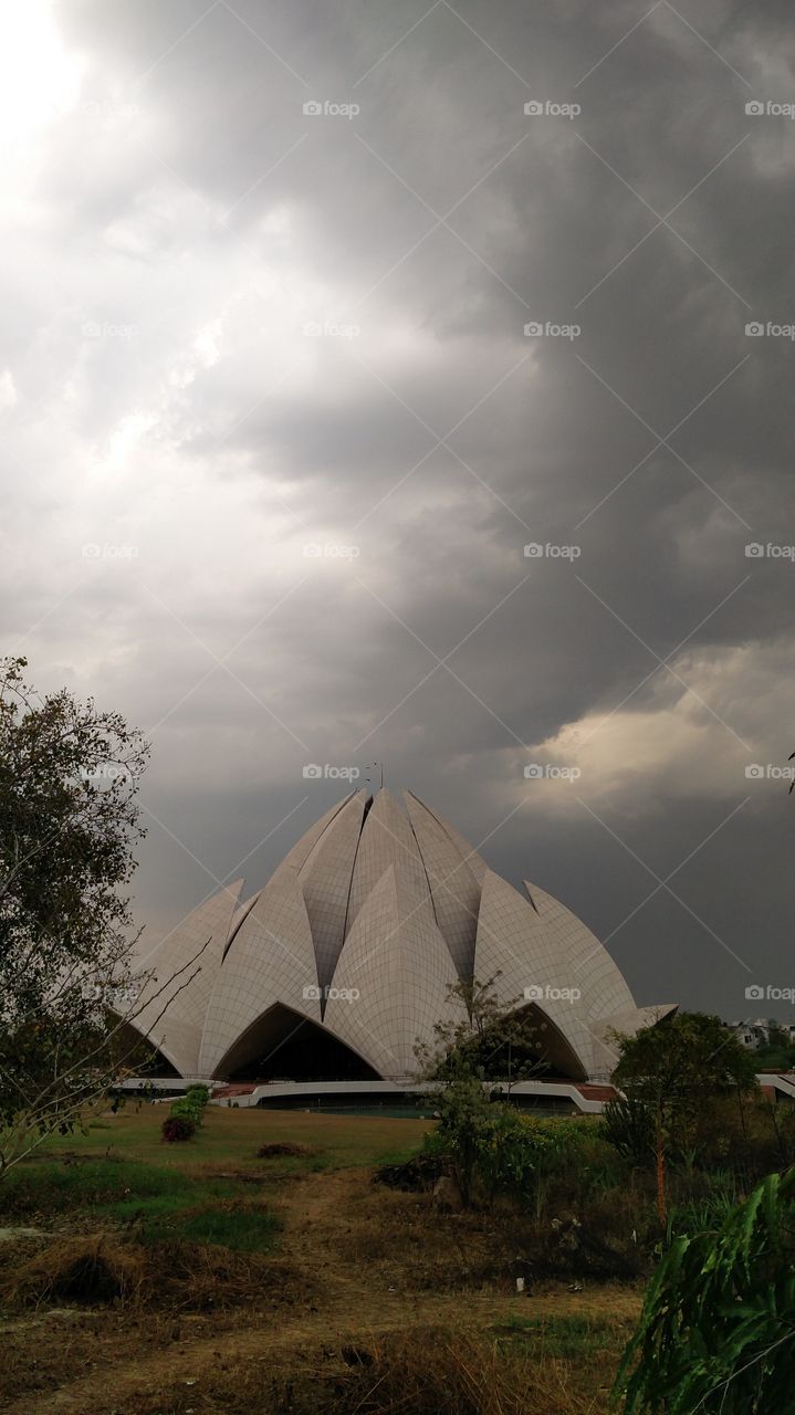 lotus temple evening clouds architecture beauty outside