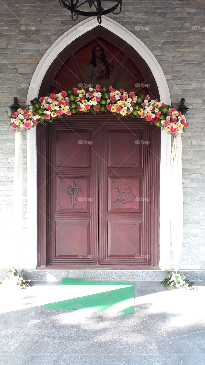 Decorated door of a church on a marriage day