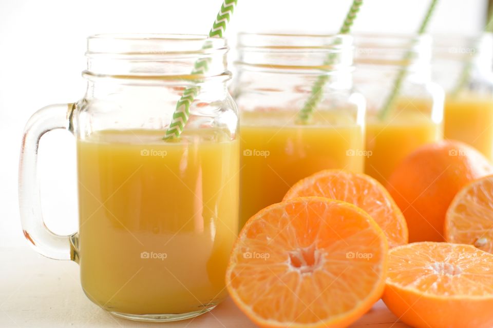 Row of Glasses of Orange Juice 