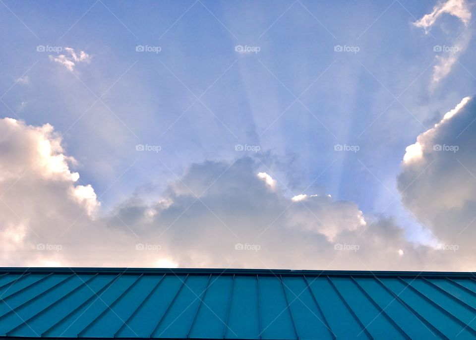 View of roof and sky