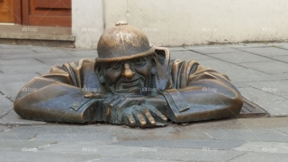 Man At Work Sculpture