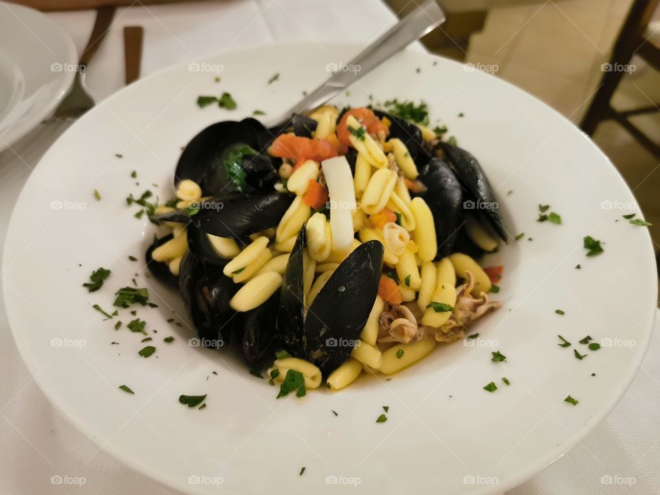 Tagnalini dish table served view inside joy happy round circle sea food yummy healthy