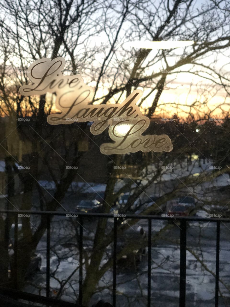 Live laugh love. Inspiration. Sunset through the window 