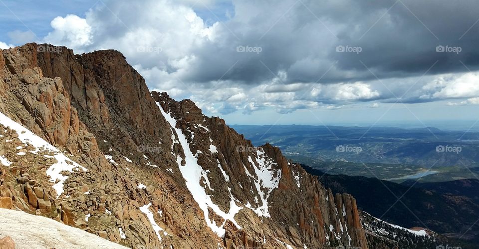 Rocky mountain against dramatic sky