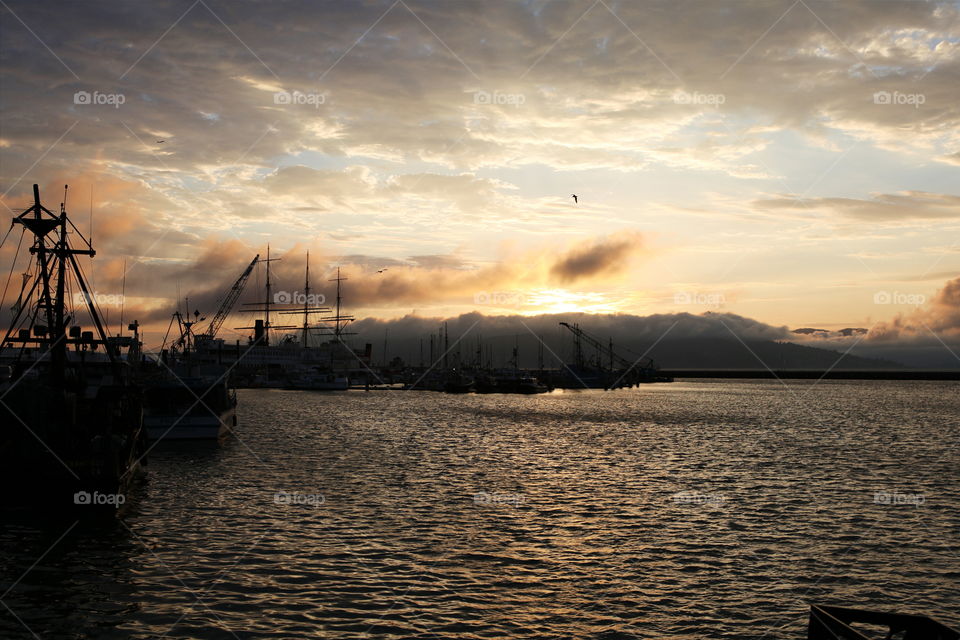 View of port during sunset