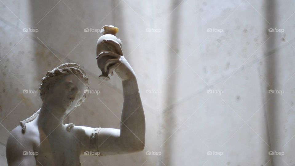 Statue with vase