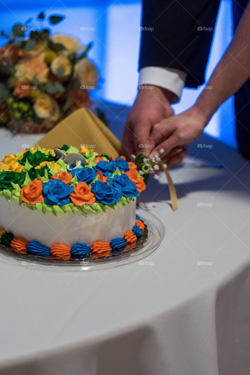 Wedding ceremony reception cake cut
