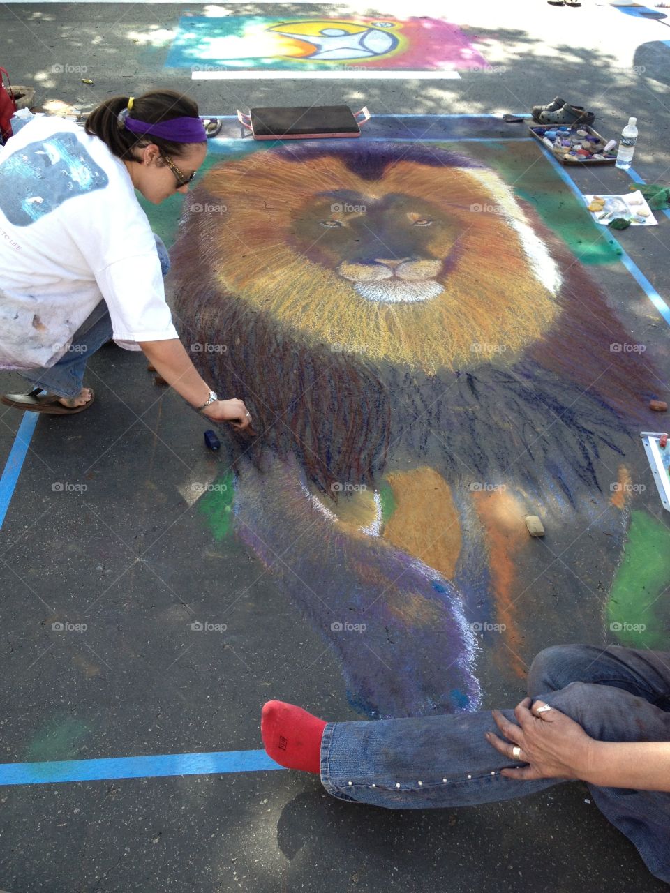 Sidewalk chalk art. Art Walk festival in Carlsbad, California. Local artists create chalk art drawings for judging by the public.  