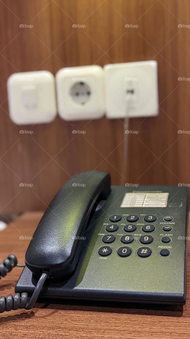 Please dial me using your cable telephone