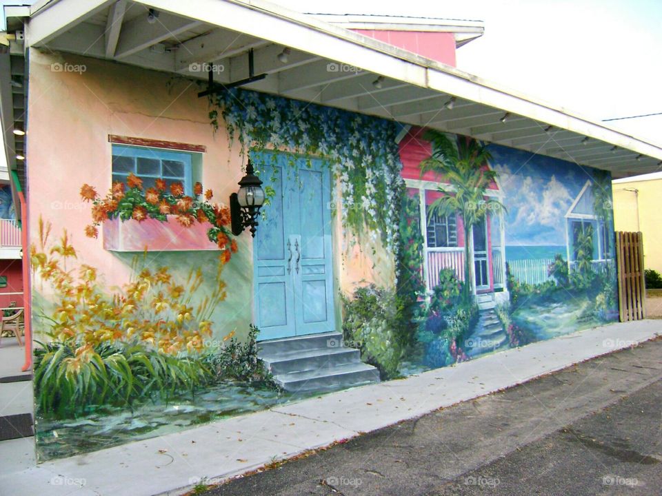 building mural. faux painted building facade, tropical mural