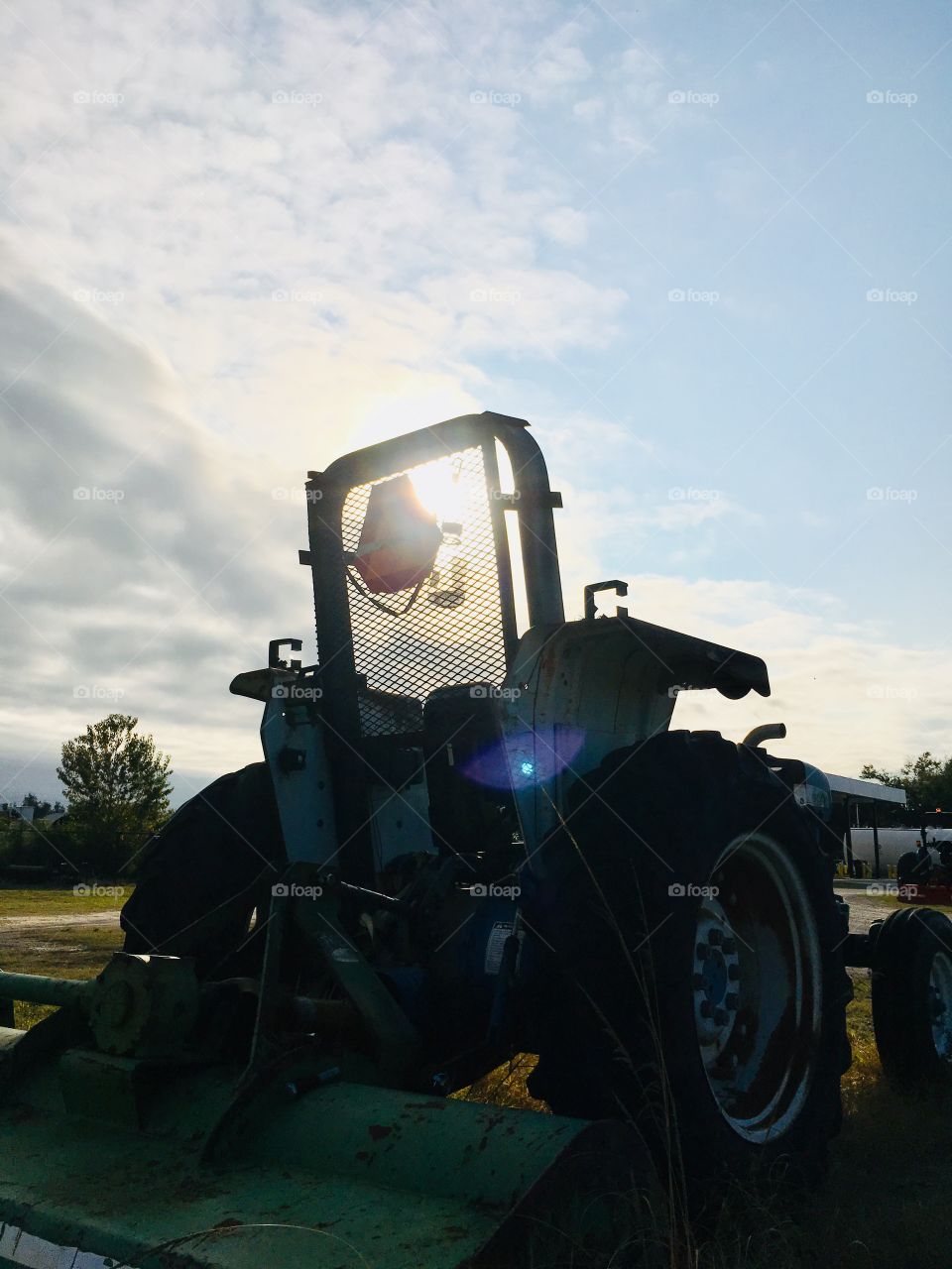 Sundown over a tractor 🚜