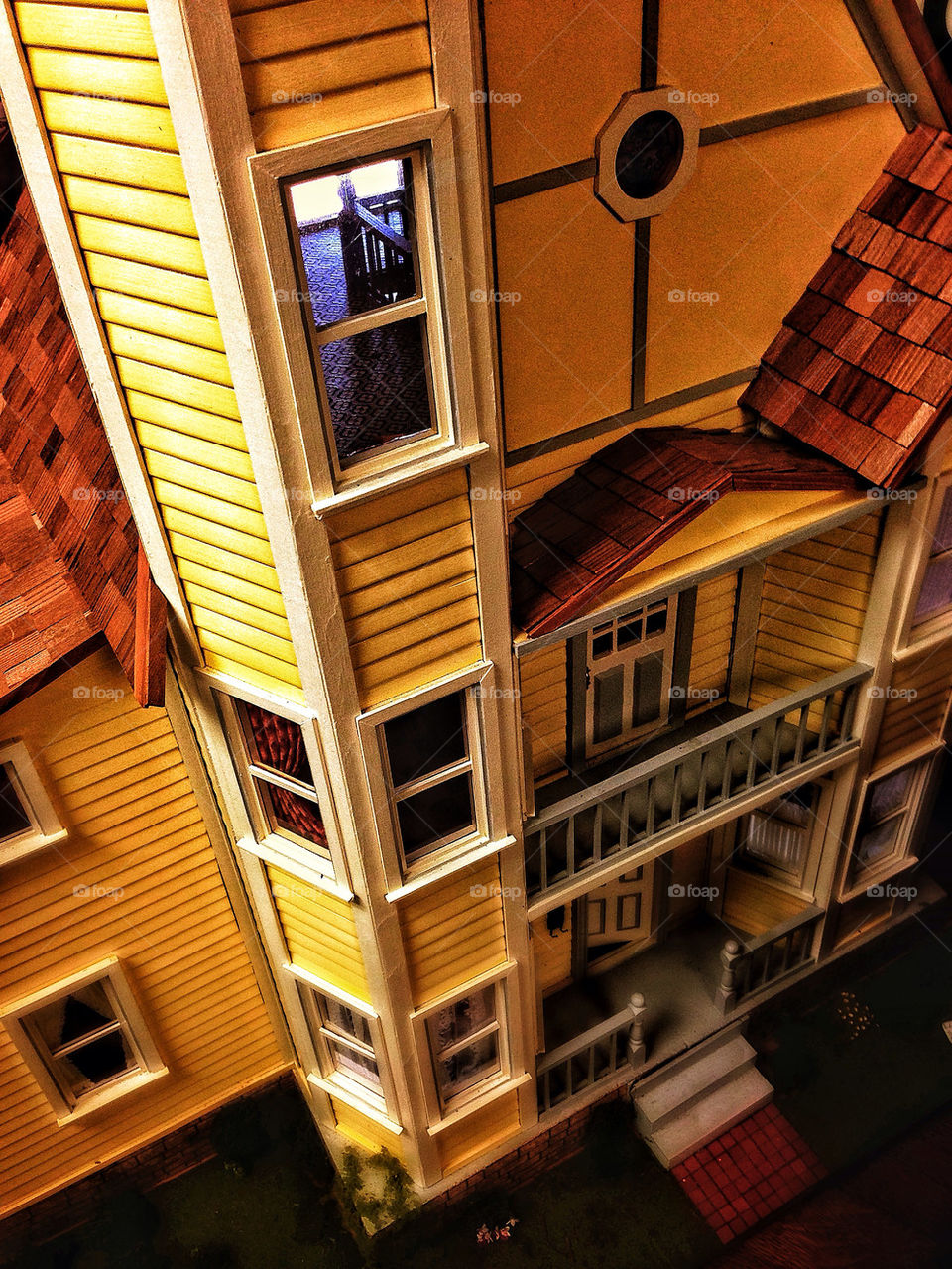 Vertigo perspective looking down on a vintage dollhouse