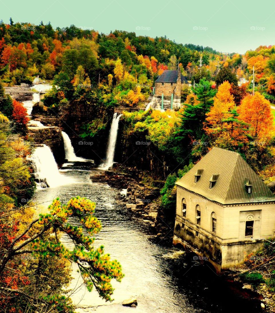 Ausable chasm. Waterfall and cottage along Ausable Chasm at Ausable River