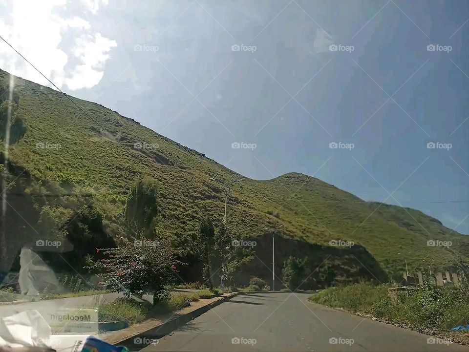 Glory be to God, the magnificent and picturesque view and the natural green trees are a view that is nothing more wonderful than it