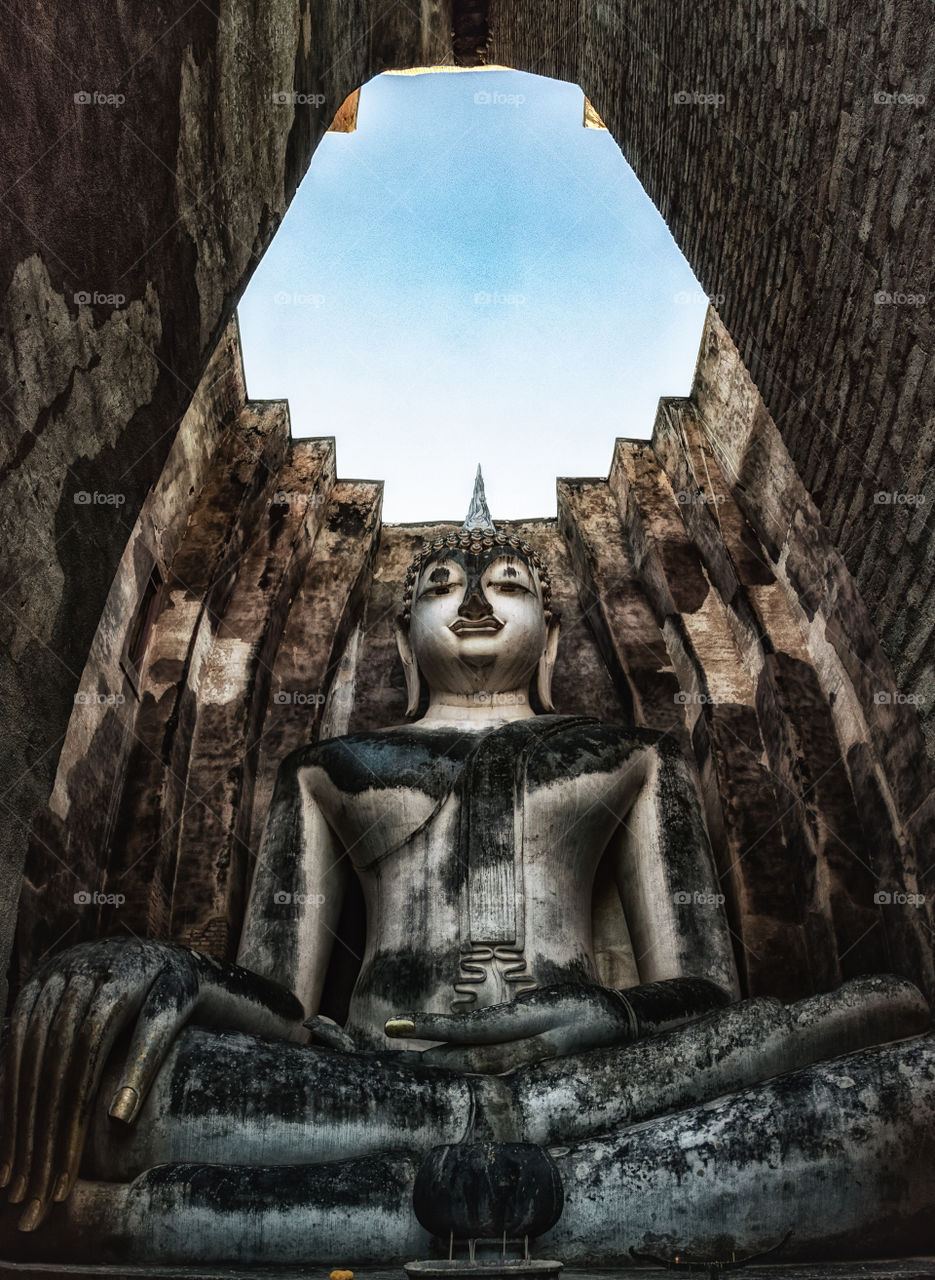 huge stucco Buddha image in Sukhothai, Thailand
