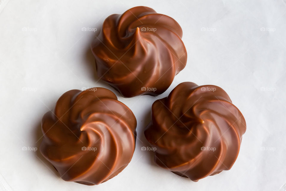 Chocolate covered biscuit with marshmallow-like filling 