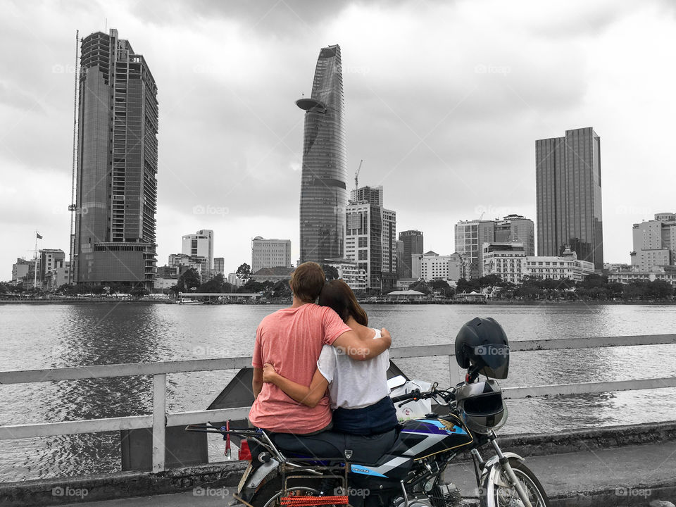 My girlfriend and me with our motorbike in front of Ho Chi Minh