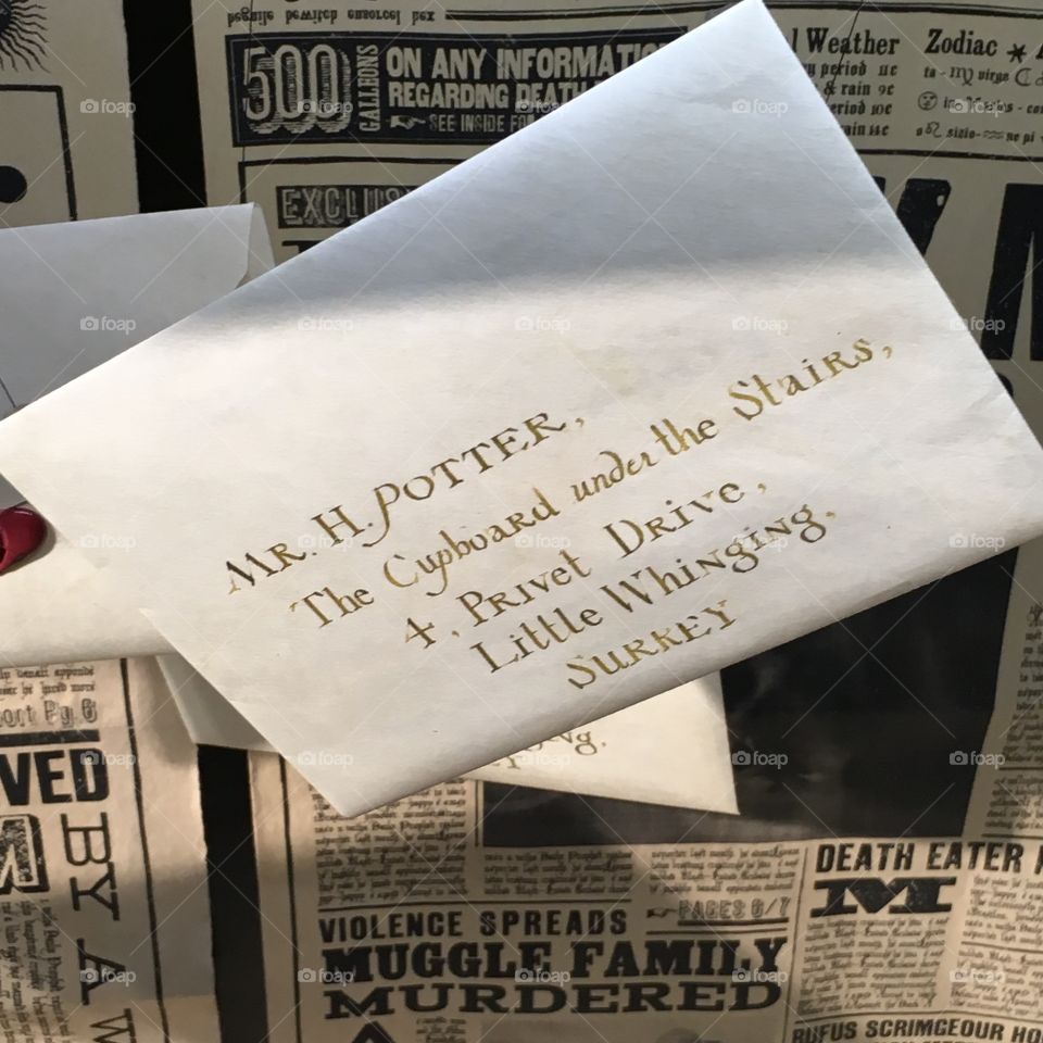 Harry Potter’s letter with a background of The Daily Prophet. An actual film prop.  