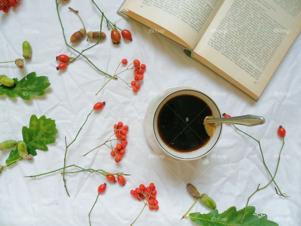 black coffee cup and book