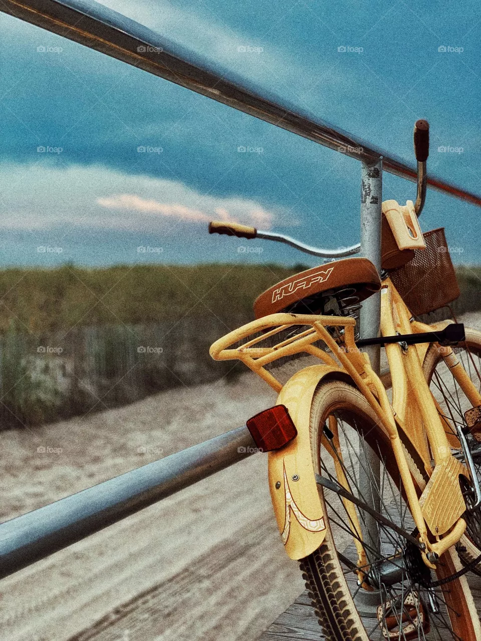 yellow Bike on the boardwalk