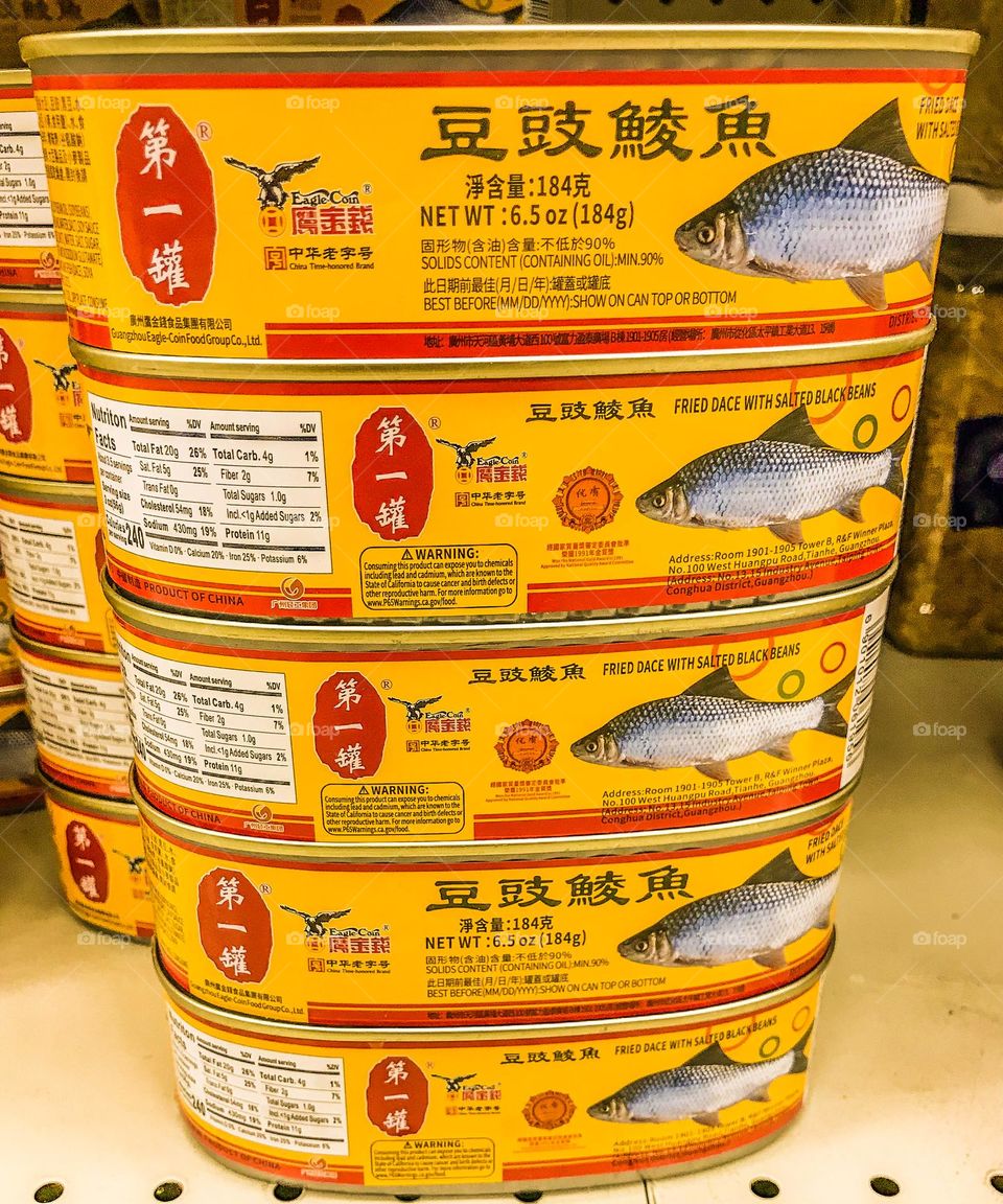 Canned fried fishes at the supermarket.