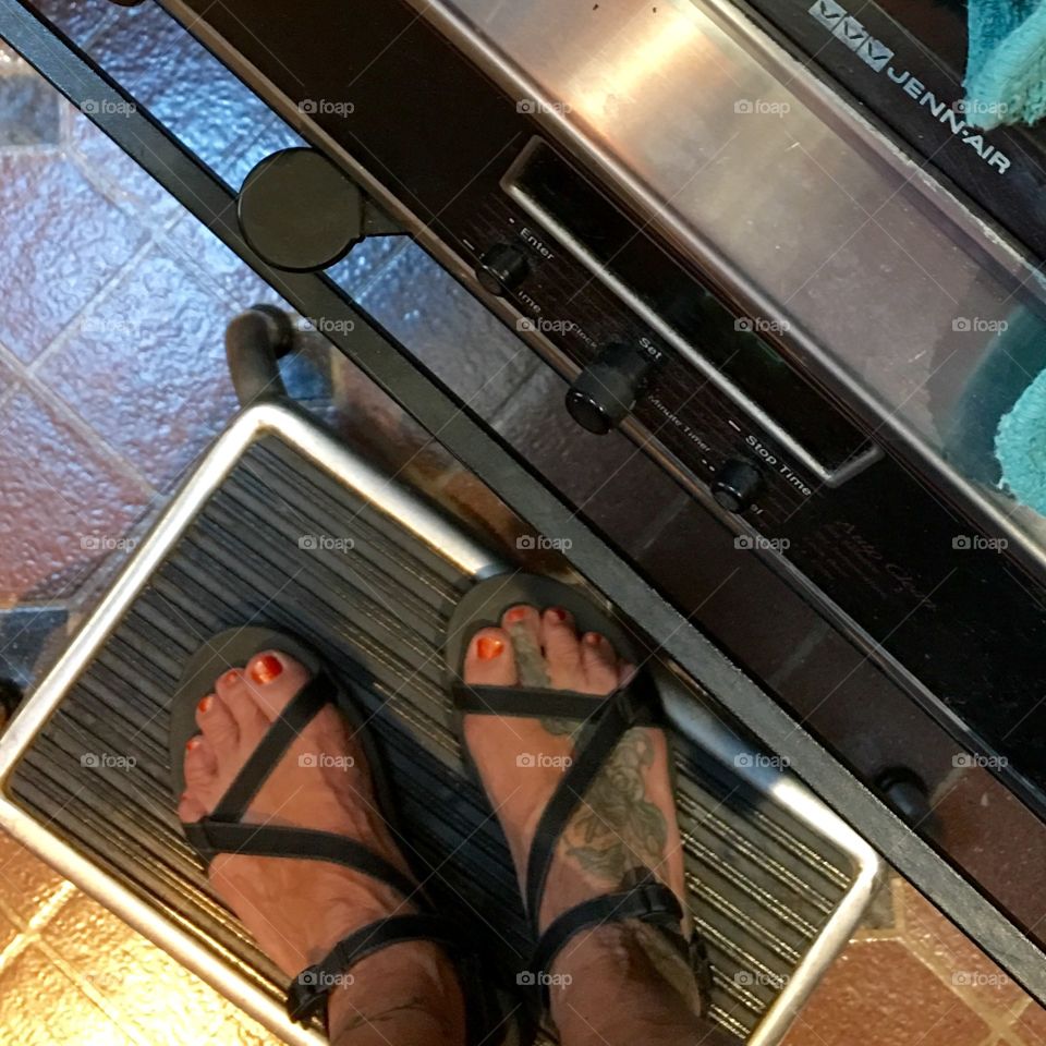 There's a cabinet above our stove & in order to reach it I need the footstool.