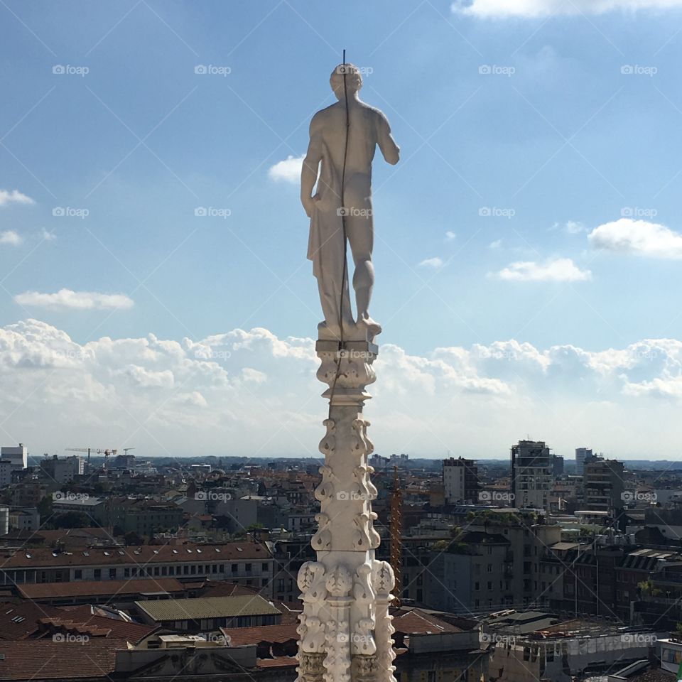 Saint watching over Milan from atop Duomo