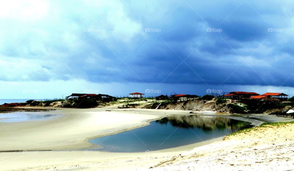 A natural swimmingpool. A beautiful beach with a natural swimmingpool