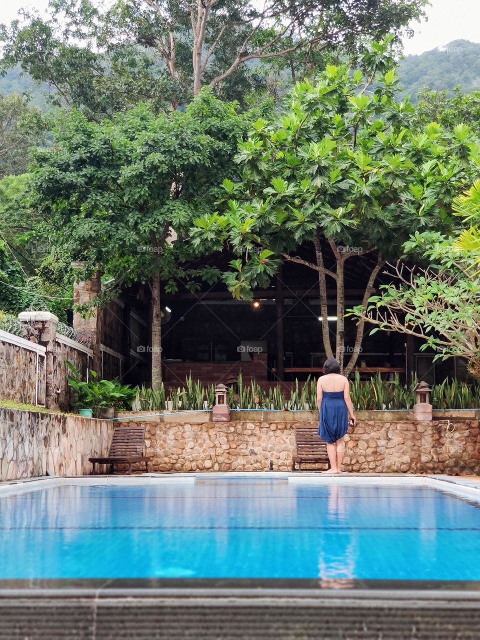 relaxing at a private swimming pool on a sunny day at Krong Kaeb Kep Province Cambodia