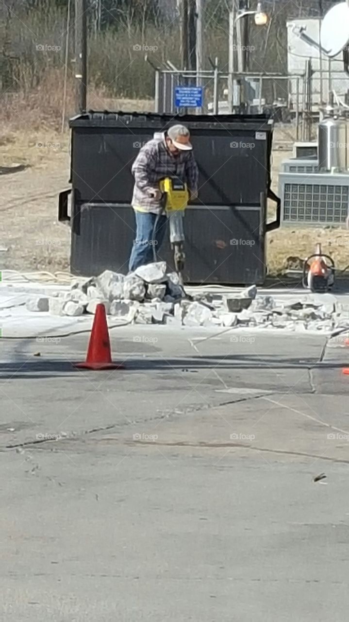 construction man with a jackhammer