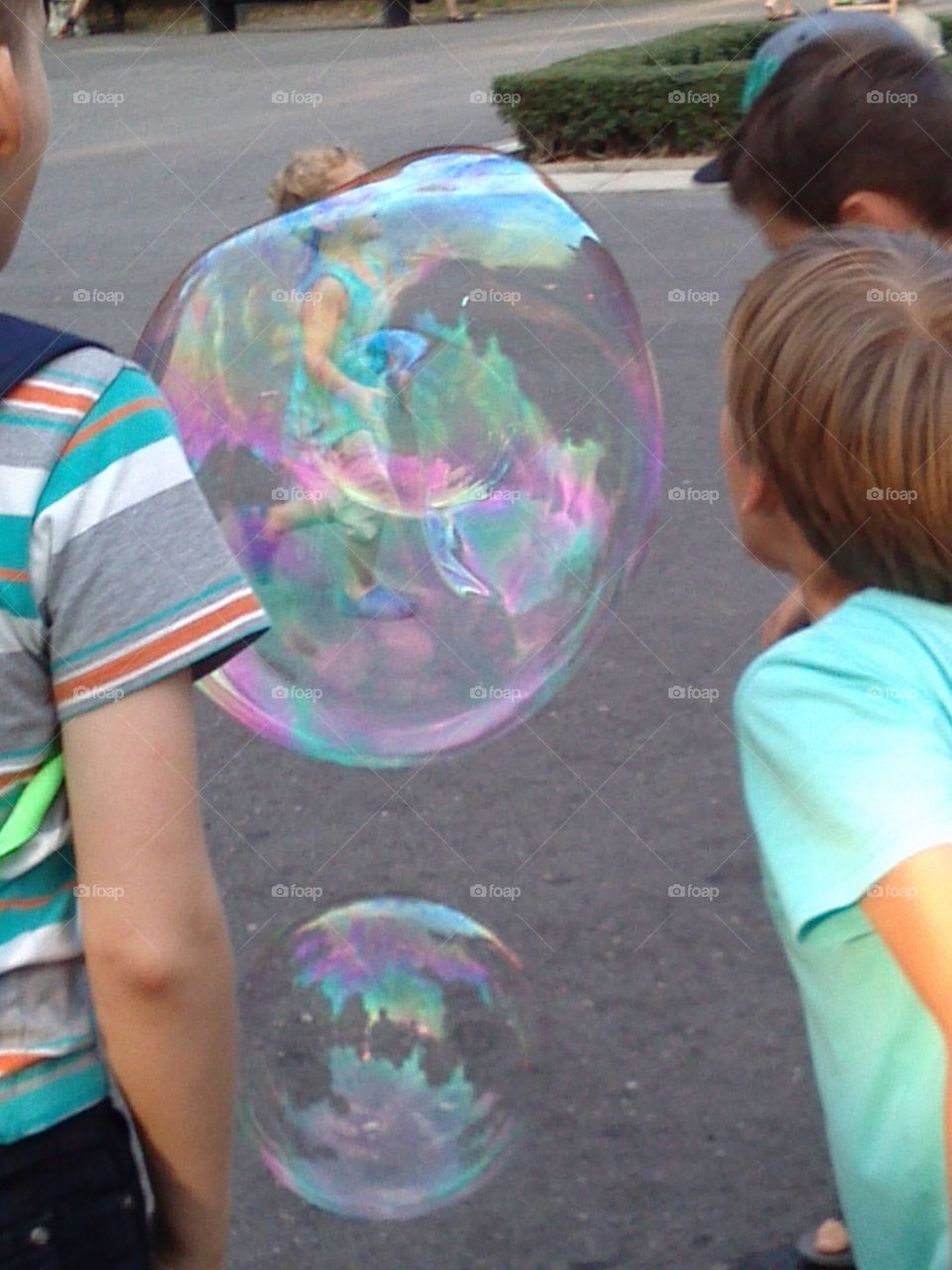 Blowing soap bubbles