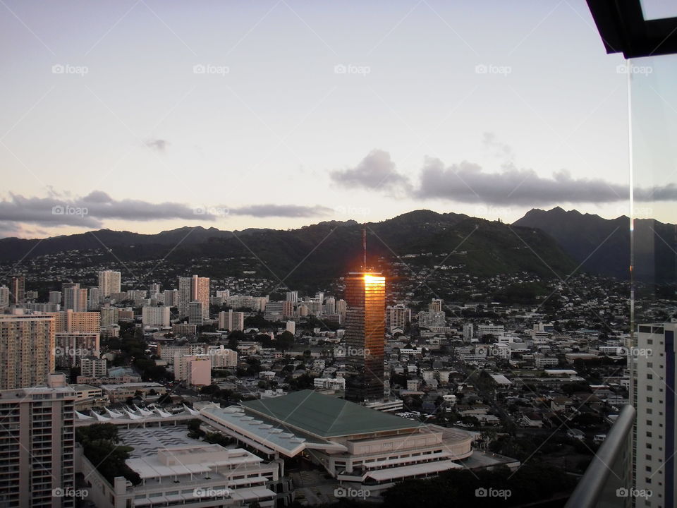 Sunrise reflection viewed from Waikiki. 