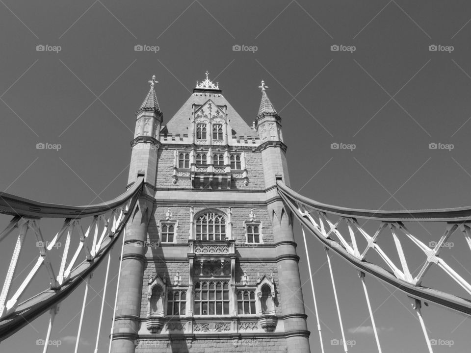 Fine architectural details of Tower Bridge in London, England on a sunny summer day. 