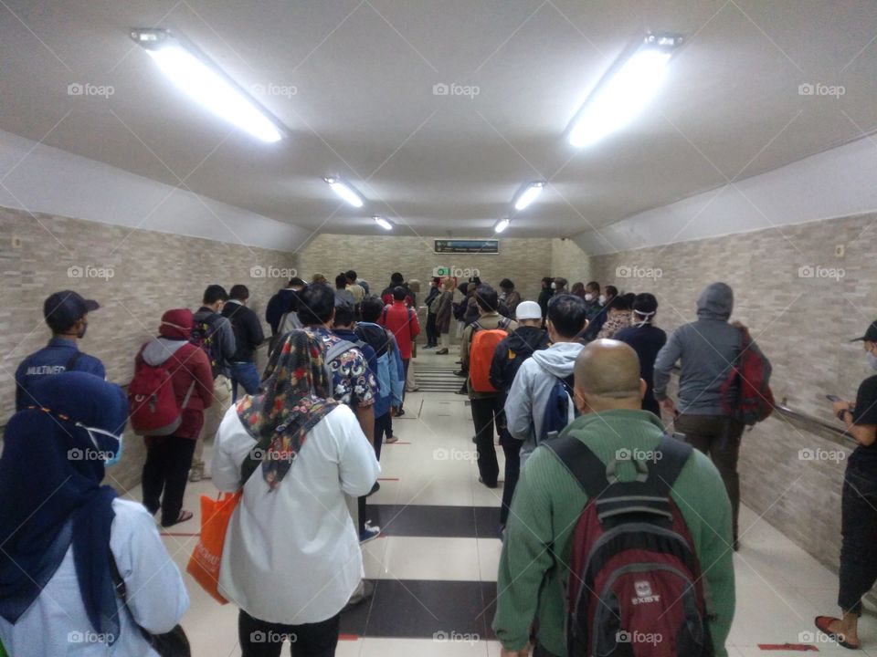 queuing with physical distancing at the Cilebut station underpass