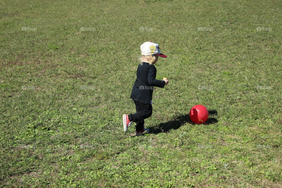 girl playing soccer