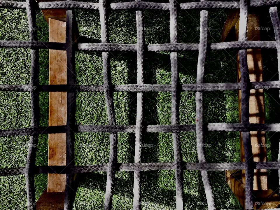 square pattern and green grass