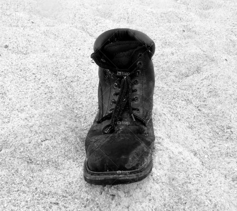 Combat boot in the sand