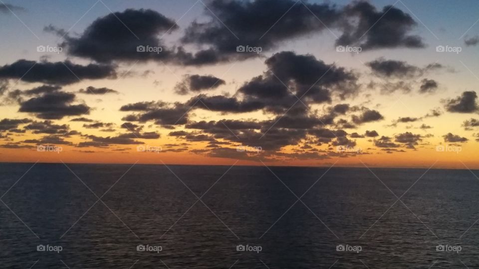 Cloudy sunset at sea