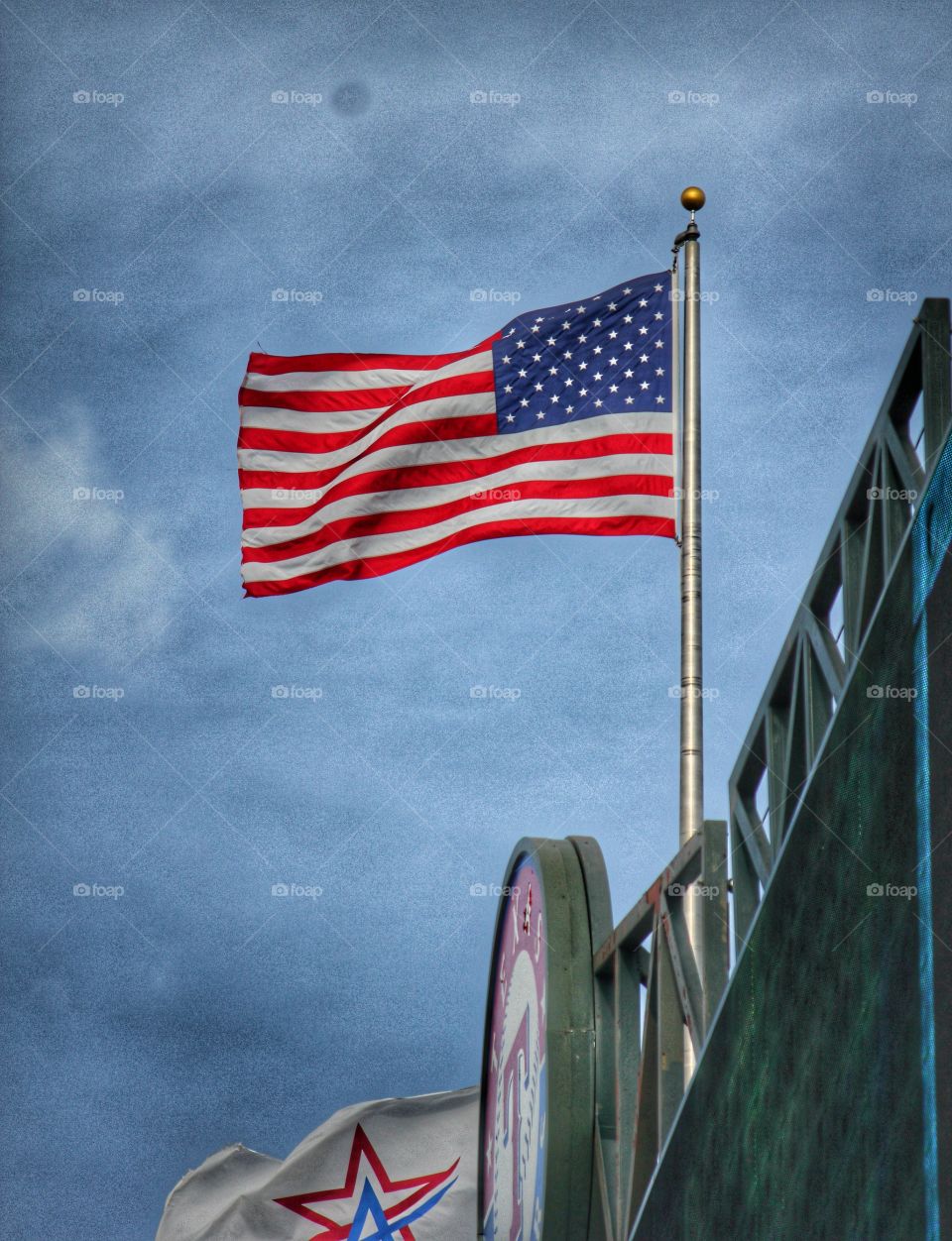 Born in the USA . American flag flying at a Texas Rangers baseball game at globe life park in Arlington Texas 