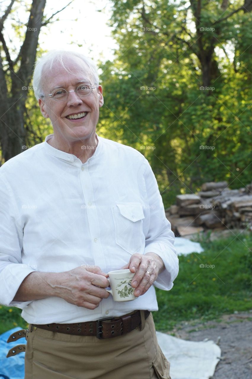 Senior man with coffee