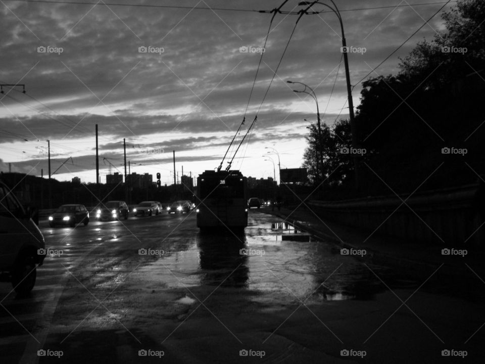 #cityinmove, Nightly city, trolleybuses, motor-car cork, wet road, headlights