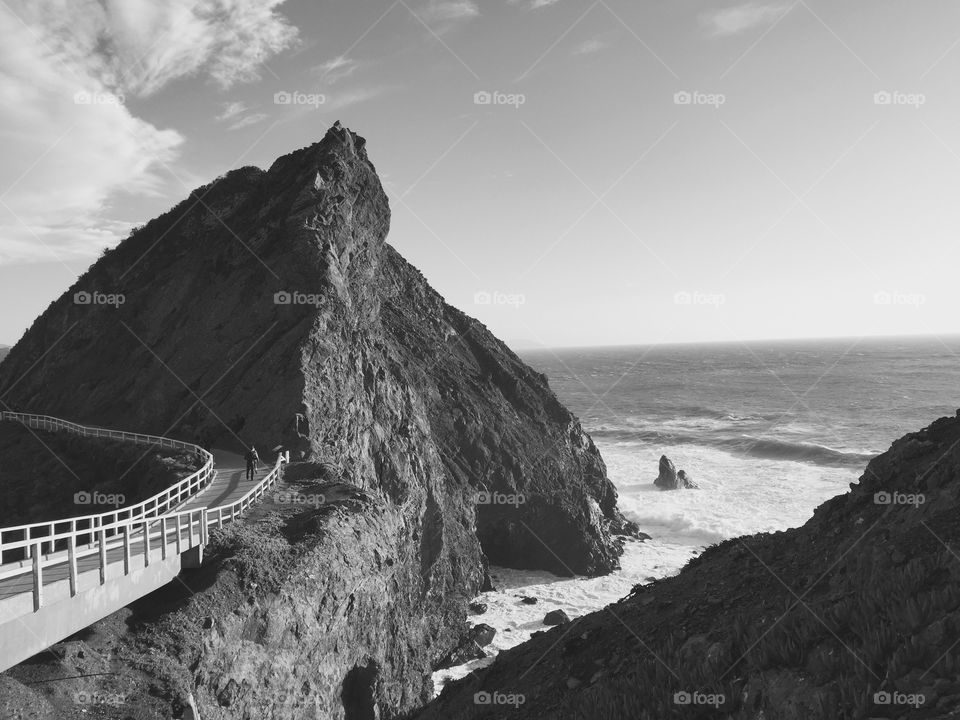 A man walking on the bridge