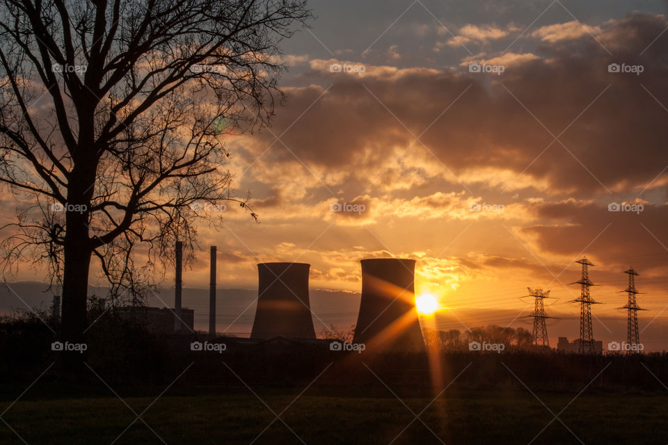 Sunset near a factory